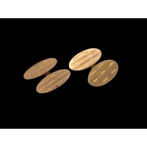 48 - Pair of 9ct rose gold cufflinks, hallmarked Birmingham 1912, with engine-turned and foliate decorati... 