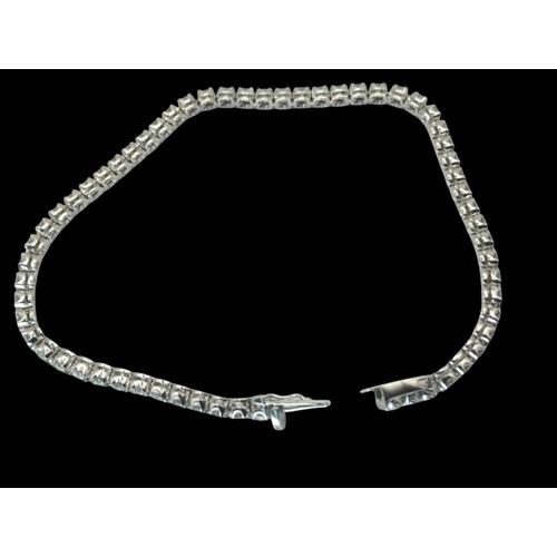 55 - 18ct white gold and diamond line bracelet, hallmarked, the diamonds together stated to weigh 2.00 ca... 