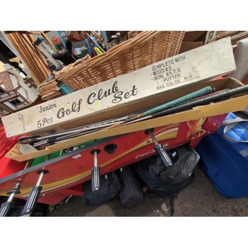 356 - Box of junior golf clubs