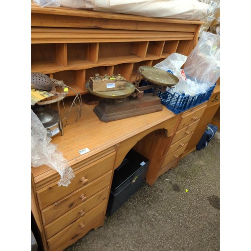 385 - Pine tambour fronted desk. W127cm. D45cm. H125cm