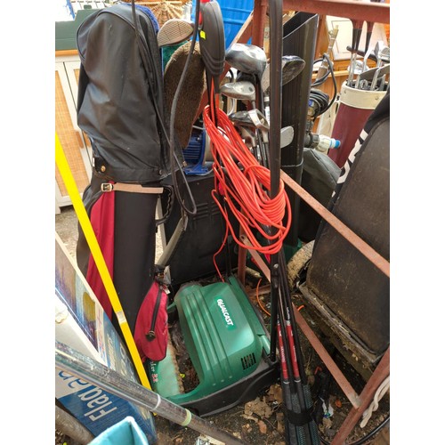 402 - Qualcast electric lawn rake 32.