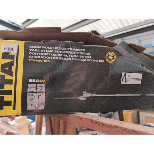 396 - Titan electric pole hedge trimmer in box