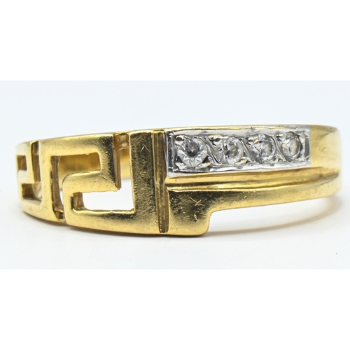 48 - Yellow metal and paste ring with Greek key design, marked 18ct., size U, gross weight 5.24 grams... 