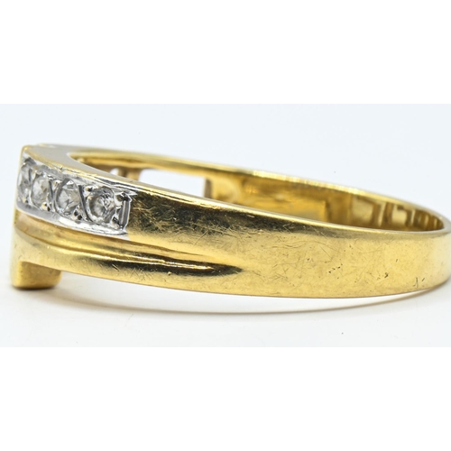 48 - Yellow metal and paste ring with Greek key design, marked 18ct., size U, gross weight 5.24 grams... 