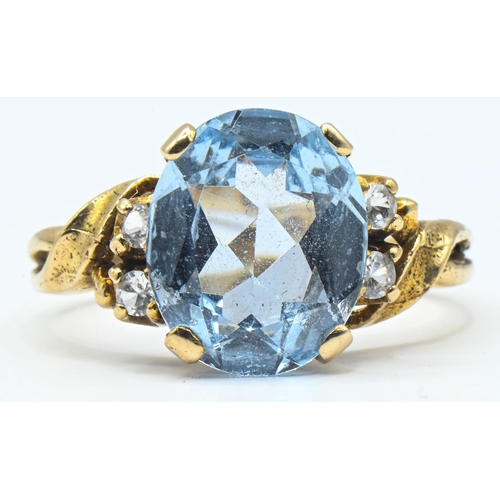 50 - 9ct gold, blue topaz and white stone ring, hallmarked, size P1/2, gross weight 3.62 grams