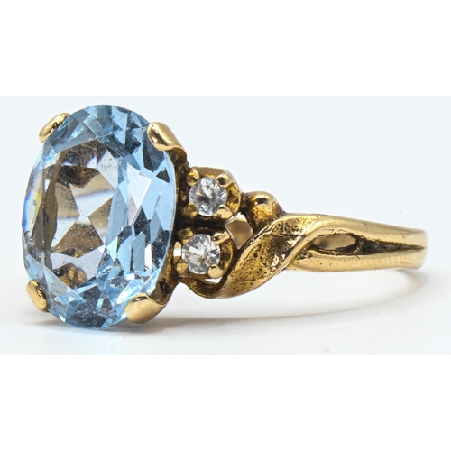 50 - 9ct gold, blue topaz and white stone ring, hallmarked, size P1/2, gross weight 3.62 grams