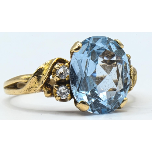 50 - 9ct gold, blue topaz and white stone ring, hallmarked, size P1/2, gross weight 3.62 grams