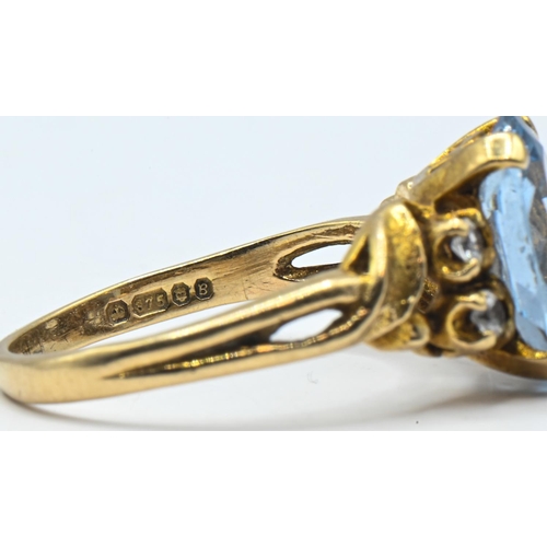 50 - 9ct gold, blue topaz and white stone ring, hallmarked, size P1/2, gross weight 3.62 grams