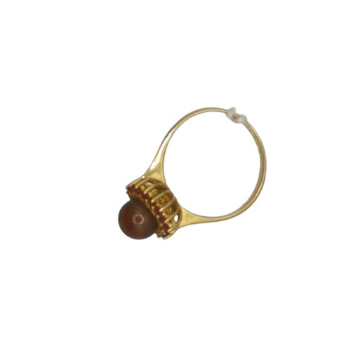 52 - Brown pearl and red stone cluster ring, in a yellow metal mount stamped 18K and 750, size T, gross w... 