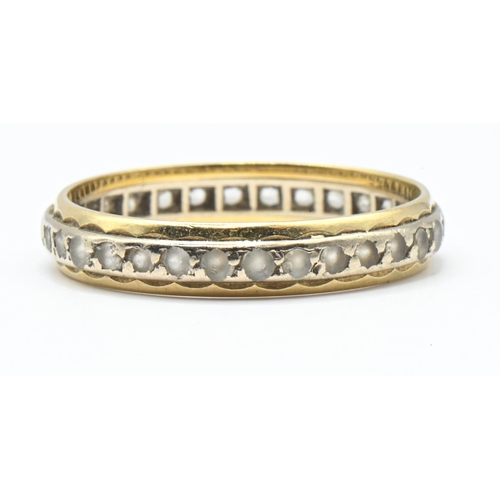 56 - White stone set eternity ring, the yellow metal mount stamped 18CT, size P1/2, gross weight 2.36 gra... 