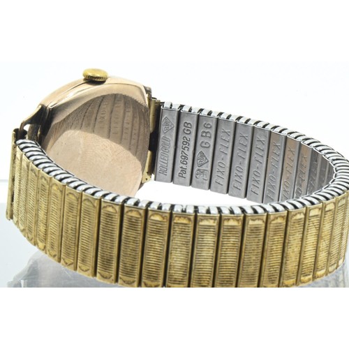 10 - Avia 9ct gold cased watch, the textured silvered dial with raised gilt Arabic numerals and subsidiar... 