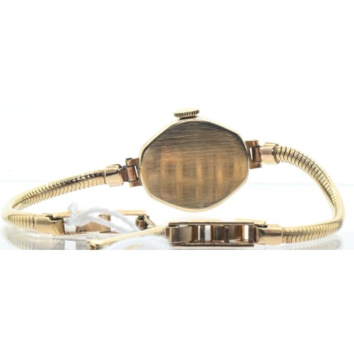 3 - Ladies Everite 9ct gold cased watch with a 9ct gold snake link strap, the silvered dial with applied... 