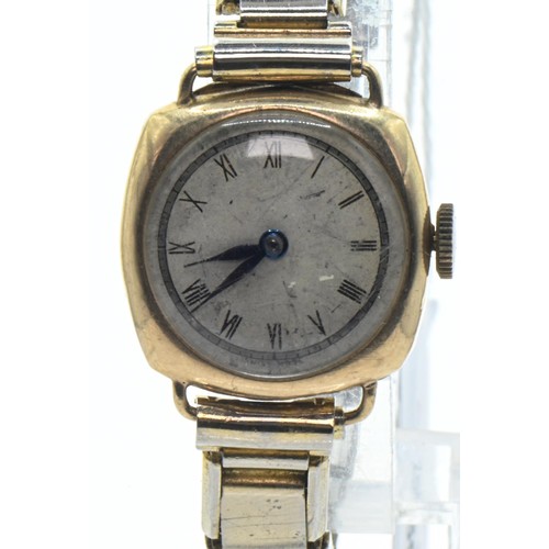 9 - 9ct gold cased ladies watch, the silvered dial with Roman numerals, inside case back hallmarked&nbsp... 
