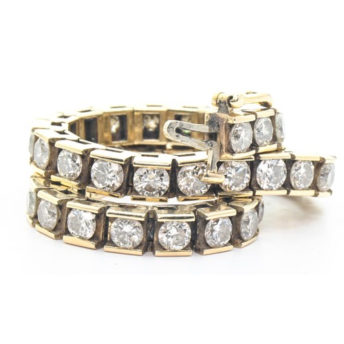 46 - Diamond bracelet, designed as a line of forty-two modern round brilliant-cut diamonds estimated to w... 