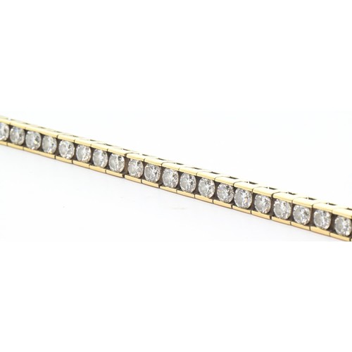 46 - Diamond bracelet, designed as a line of forty-two modern round brilliant-cut diamonds estimated to w... 
