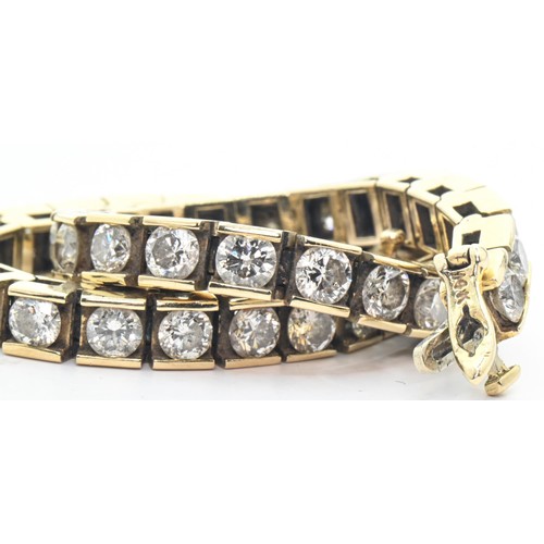 46 - Diamond bracelet, designed as a line of forty-two modern round brilliant-cut diamonds estimated to w... 