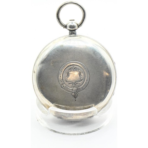 22 - Silver cased open face key wind pocket watch in leather travel case, the white dial marked Fattorini... 