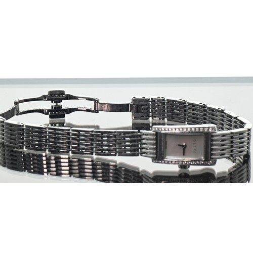14A - Gucci ladies stainless steel quartz wristwatch, with mother-of-pearl dial flanked by diamonds, taper... 