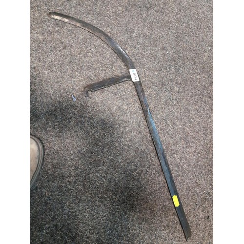 101A - African throwing knife, circa 1900. Length 70.5cm, loss to one end.