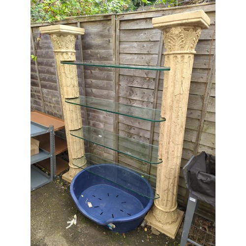 102 - 2 x fibreglass columns supporting 4 x reinforced glass shelves. Shelves are unsecured. W148cm D30cm ... 