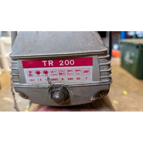 410 - Taskmaster air compressor. Sold in working order.