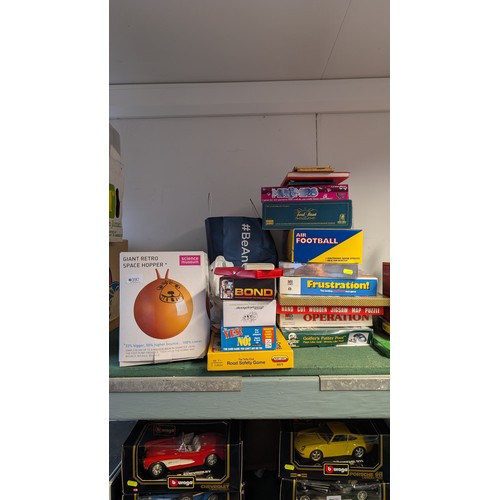 397 - Collection of toys & games including Trivial pursuit, air football + giant retro space hopper in... 