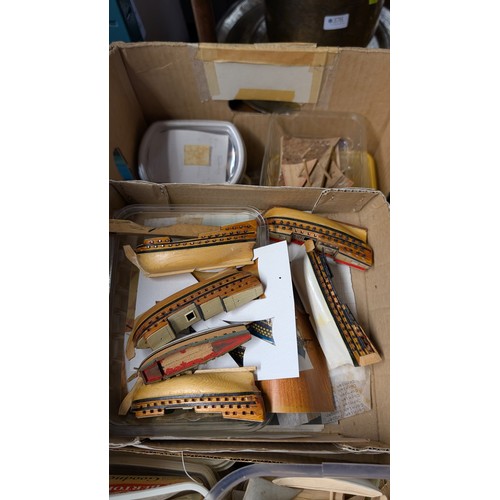 395 - Large quantity of model boat kits in box
