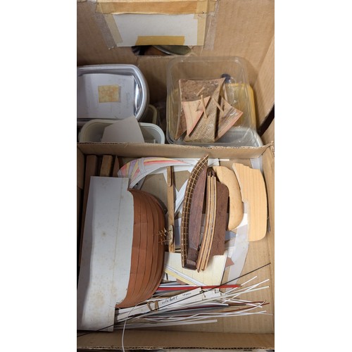 395 - Large quantity of model boat kits in box