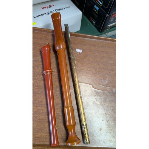 374 - 2x Wooden recorders + Metal pipe.