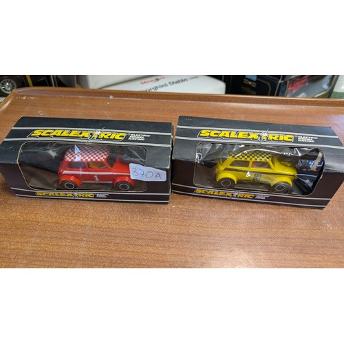 370A - Scalextric C.122 Mini 1275G.T Rally specials in box 1x yellow 1x red.