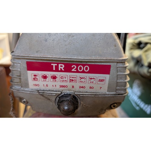 410 - Taskmaster air compressor. Sold in working order.