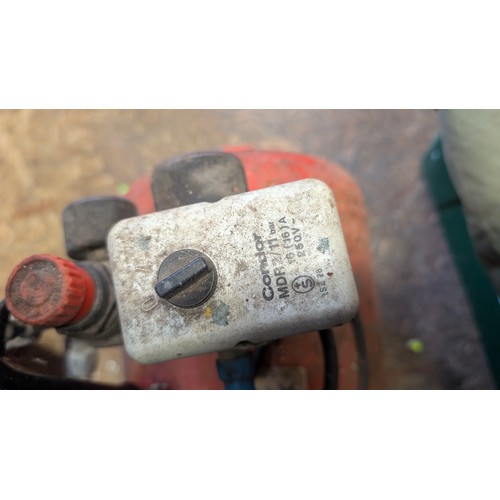 410 - Taskmaster air compressor. Sold in working order.