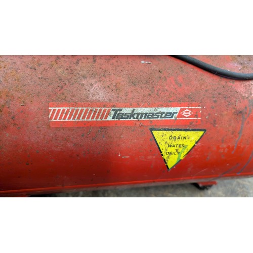 410 - Taskmaster air compressor. Sold in working order.