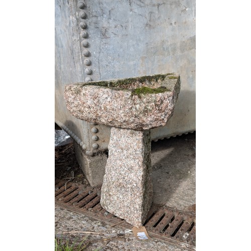 Small triangular granite birdbath. H36cm.