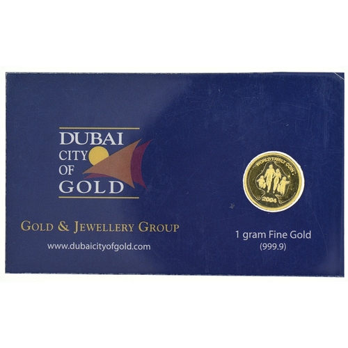 14 - 1 gram of 999.9 gold Dubai City of Gold 2004 World Family Coin