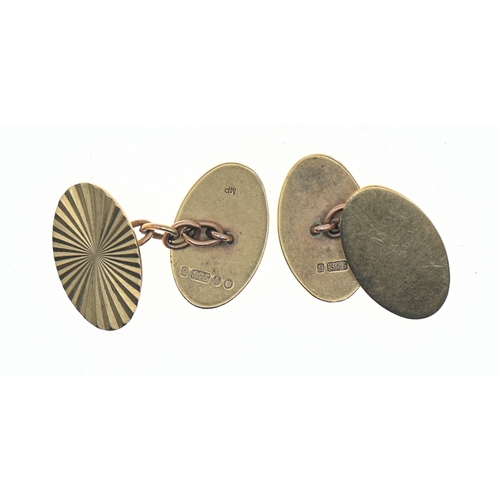 37 - Pair of 9ct gold cufflinks, hallmarked,&nbsp;sunburst pattern to one side, face length 18mm, gross w... 