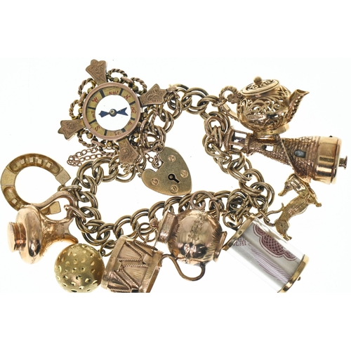 9ct gold hallmarked charm bracelet with a heart-shaped padlock clasp, suspending nine 9ct gold hallmarked charms one 14ct gold hallmarked charm, gross weight 54.35 grams
