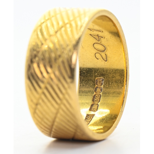 106 - 22ct gold hatch patterned band ring, hallmarked, size L, 7.73 grams