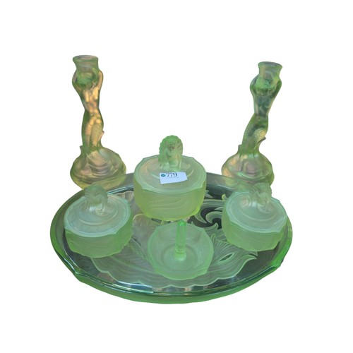 Art Deco green glass seven piece Mermaid dressing table set comprising a  tray, three lidded pots, tw