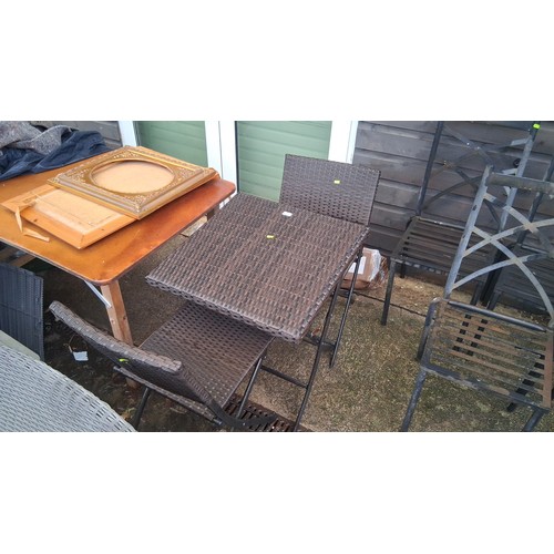 64 - Bistro set comprising a square woven-resin table with folding metal base, and pair of matching foldi... 