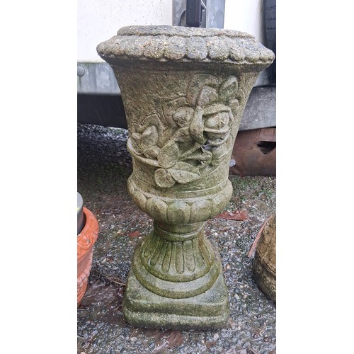 77 - One cast stone garden urn planter, the flared bowl with scalloped rim and applied rose garland relie... 