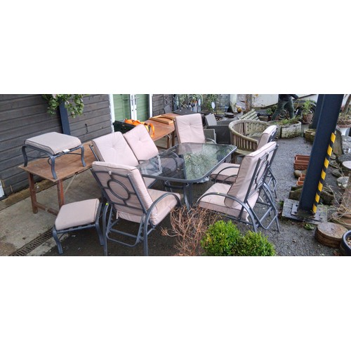 101 - Set of 4 metal garden chairs with slatted seats and circular back detail, together with a rectangula... 