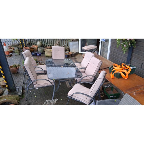 101 - Set of 4 metal garden chairs with slatted seats and circular back detail, together with a rectangula... 