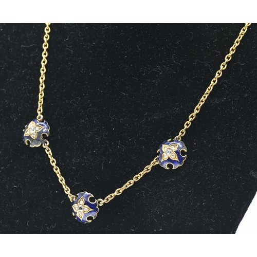 4 - Enamel and diamond necklace, designed as a yellow metal chain set to the front with three spaced blu... 