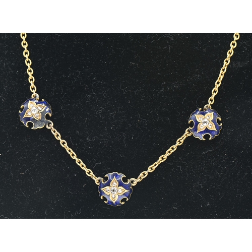 4 - Enamel and diamond necklace, designed as a yellow metal chain set to the front with three spaced blu... 