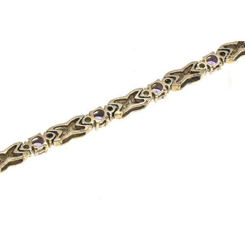 7 - 9ct gold, amethyst and white stone bracelet, hallmarked, length 195mm, gross weight 16.15 grams... 