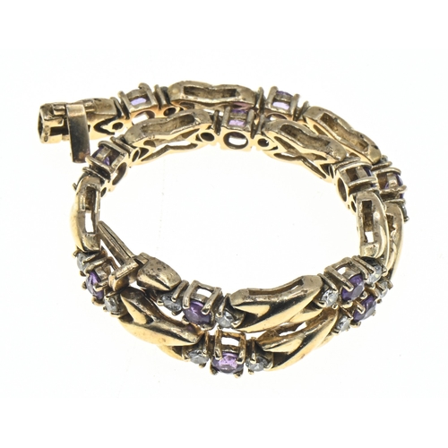 7 - 9ct gold, amethyst and white stone bracelet, hallmarked, length 195mm, gross weight 16.15 grams... 