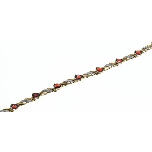 8 - 9ct gold, garnet and diamond bracelet, hallmarked, length 195mm, gross weight 7.9 grams