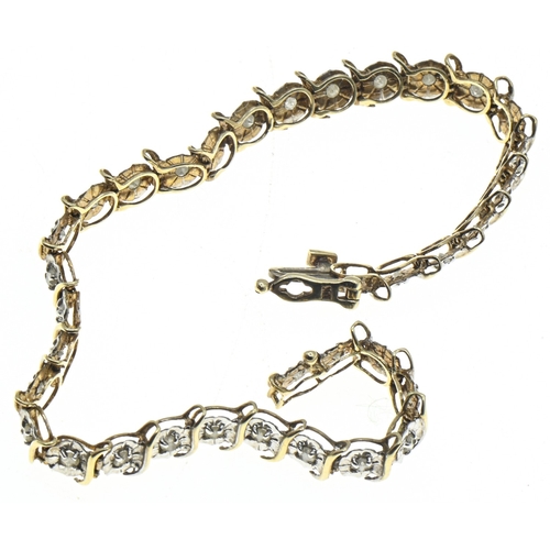 27 - 9ct gold and diamond bracelet, hallmarked, length 185mm, gross weight 6.07 grams