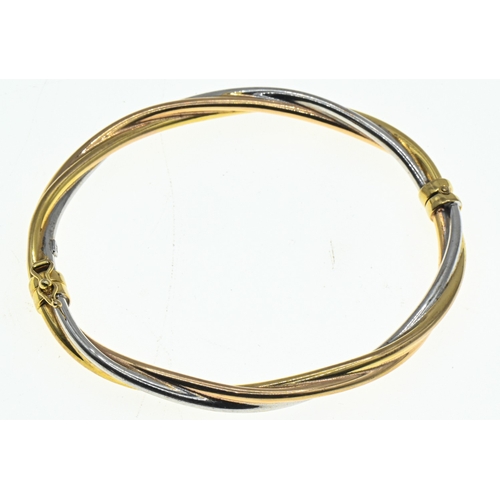 29 - 9ct tri-coloured gold twist design hinged bracelet, hallmarked, inner width 60mm, gross weight 6.6 g... 